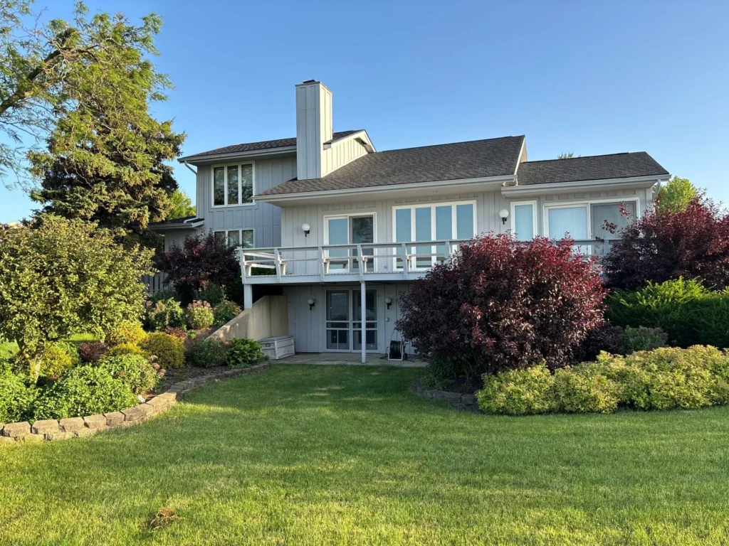 Beautiful home with landscaping and professional roof
