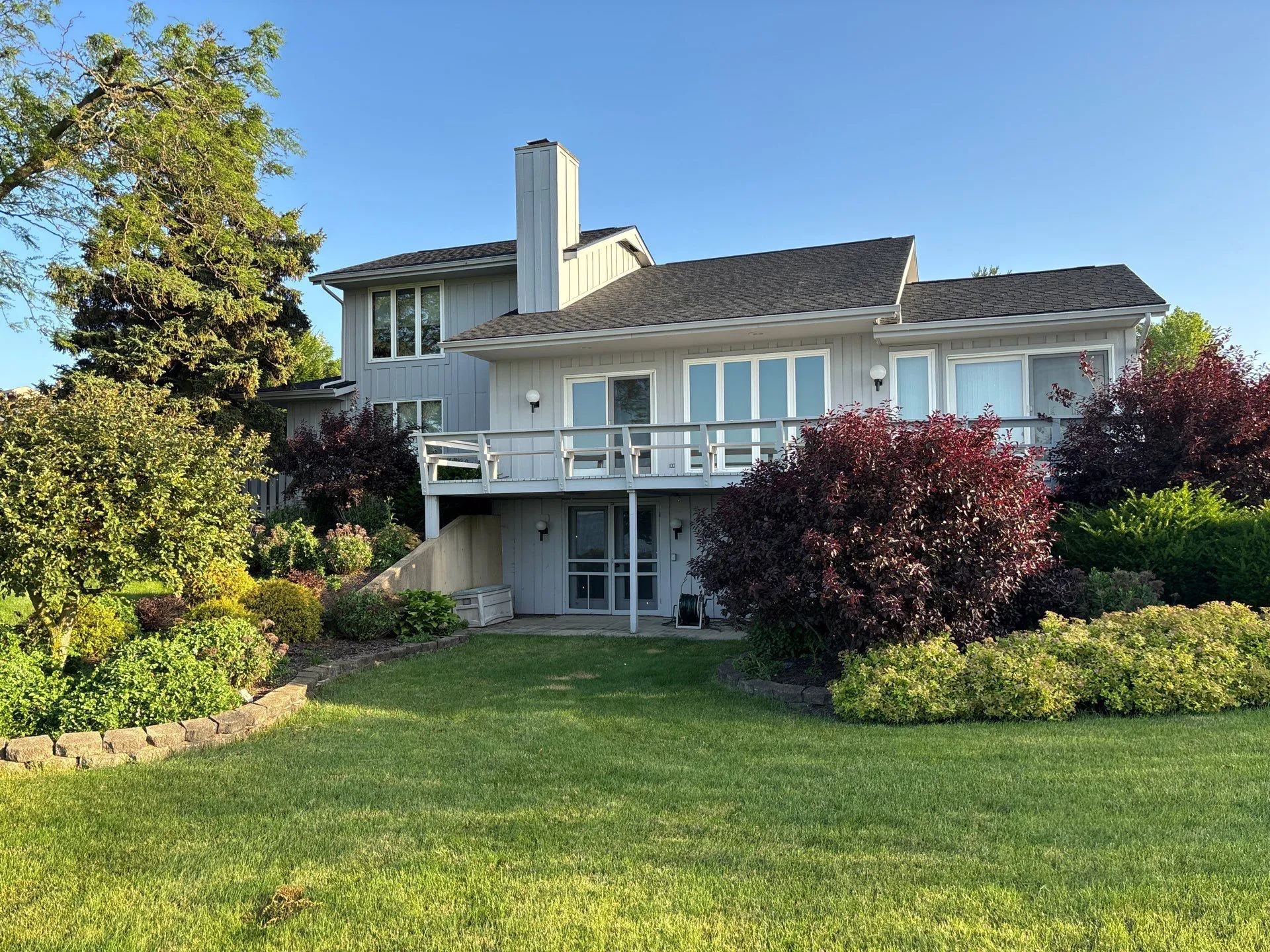 Beautiful home with landscaping and professional roof